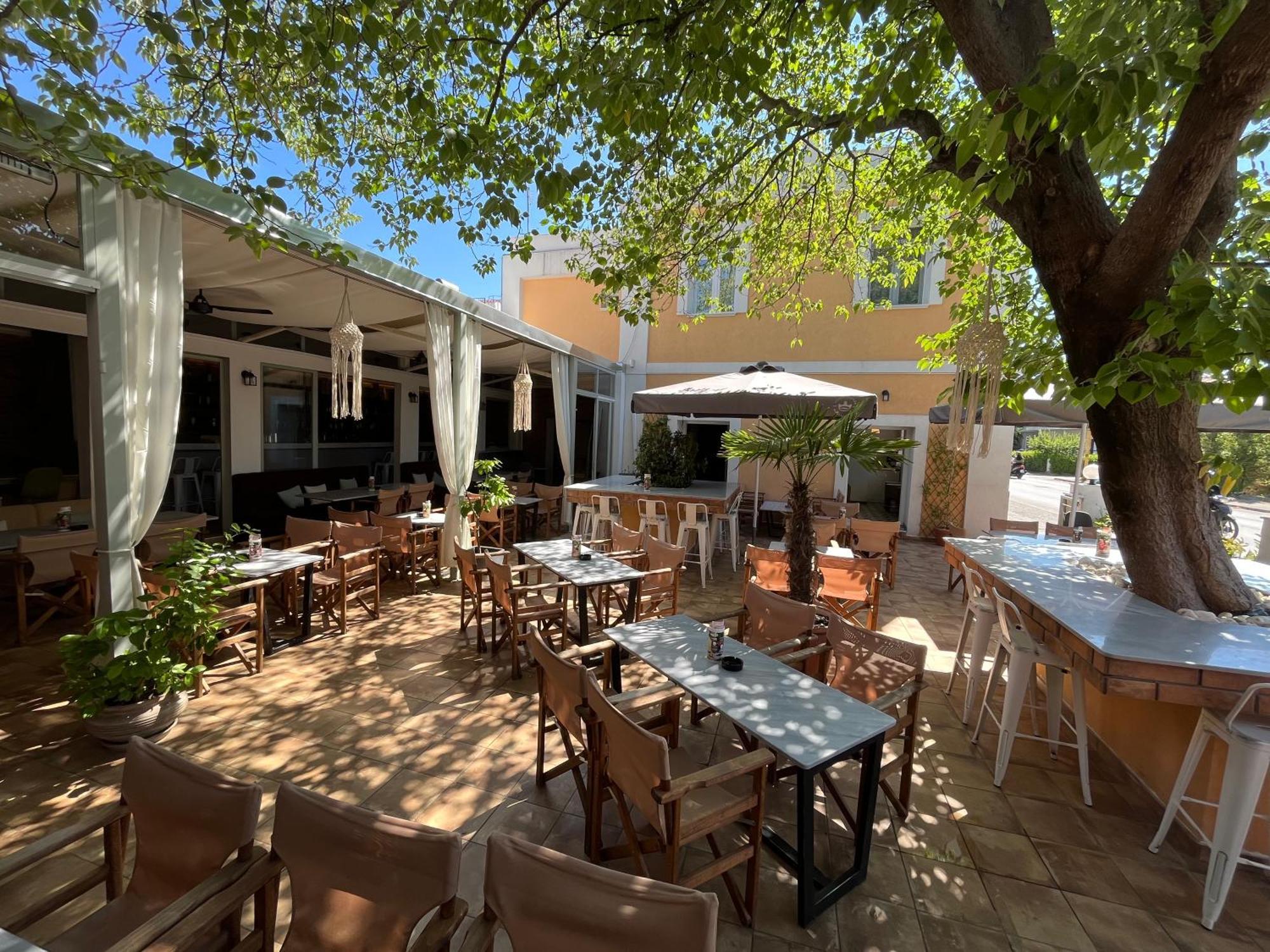 Giardino High Living Suites Drama Bagian luar foto